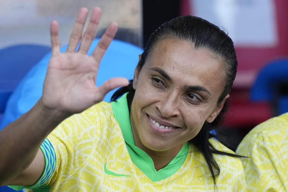Brazil's Marta waves before the women's soccer gold medal match between Brazil and the United States at the Parc des Princes during the 2024 Summer Olympics, Saturday, Aug. 10, 2024, in Paris, France. (AP Photo/Francisco Seco)