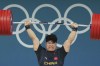 Liu Huanhua of China competes during the men's 102kg weightlifting event, at the 2024 Summer Olympics, Saturday, Aug. 10, 2024, in Paris, France. (AP Photo/Kin Cheung)