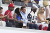Gymnast Simone Biles, 3rd left, with her parents, sits next to IAAF president Sebastian Coe, and artist Snoop Dogg to watch an athletics session at the 2024 Summer Olympics, Thursday, Aug. 8, 2024, in Saint-Denis, France. (AP Photo/Ashley Landis)