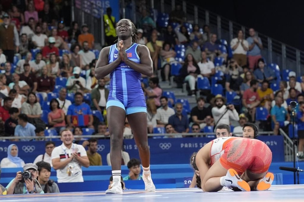 Norway's Grace Jacob Bullen celebrates after defeating Canada's Ana Paula Godinez Gonzalez in their women's freestyle 62kg bronze medal wrestling match, at Champ-de-Mars Arena, during the 2024 Summer Olympics, Saturday, Aug. 10, 2024, in Paris, France. THE CANADIAN PRESS/AP-Eugene Hoshiko