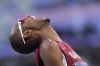 Mutaz Essa Barshim, of Qatar, shouts out during the men's high jump final at the 2024 Summer Olympics, Saturday, Aug. 10, 2024, in Saint-Denis, France. (AP Photo/Bernat Armangue)