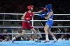 Taiwan's Lin Yu-ting, left, fights Poland's Julia Szeremeta in their women's 57 kg final boxing match at the 2024 Summer Olympics, Saturday, Aug. 10, 2024, in Paris, France. (AP Photo/John Locher)