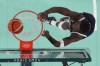 United States' Anthony Edwards (5) dunks during a men's gold medal basketball game at Bercy Arena at the 2024 Summer Olympics, Saturday, Aug. 10, 2024, in Paris, France. (Evelyn Hockstein/Pool Photo via AP)