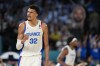 Victor Wembanyama (32), of France celebrates after scoring a basket against United States during a men's gold medal basketball game at Bercy Arena at the 2024 Summer Olympics, Saturday, Aug. 10, 2024, in Paris, France. (AP Photo/Mark J. Terrill)