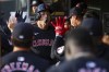 Cleveland Guardians' Steven Kwan celebrates his solo home run in the dugout during the first inning of a baseball game against the Minnesota Twins, Saturday, Aug. 10, 2024, in Minneapolis. (AP Photo/Matt Krohn)