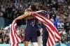 United States' Stephen Curry, left, and United States' Kevin Durant hug after the the United States won the men's gold medal basketball game at Bercy Arena at the 2024 Summer Olympics, Saturday, Aug. 10, 2024, in Paris, France. (AP Photo/Mark J. Terrill)