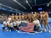 United States' team poses for a picture after winning the men's water polo bronze medal match against Hungary, at the 2024 Summer Olympics, Sunday, Aug. 11, 2024, in Paris, France. (AP Photo/Luca Bruno)