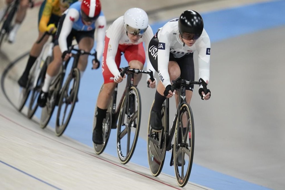 Jennifer Valente of the United States competes during the women's omnium event, at the Summer Olympics, Sunday, Aug. 11, 2024, in Paris, France. (AP Photo/Ricardo Mazalan)