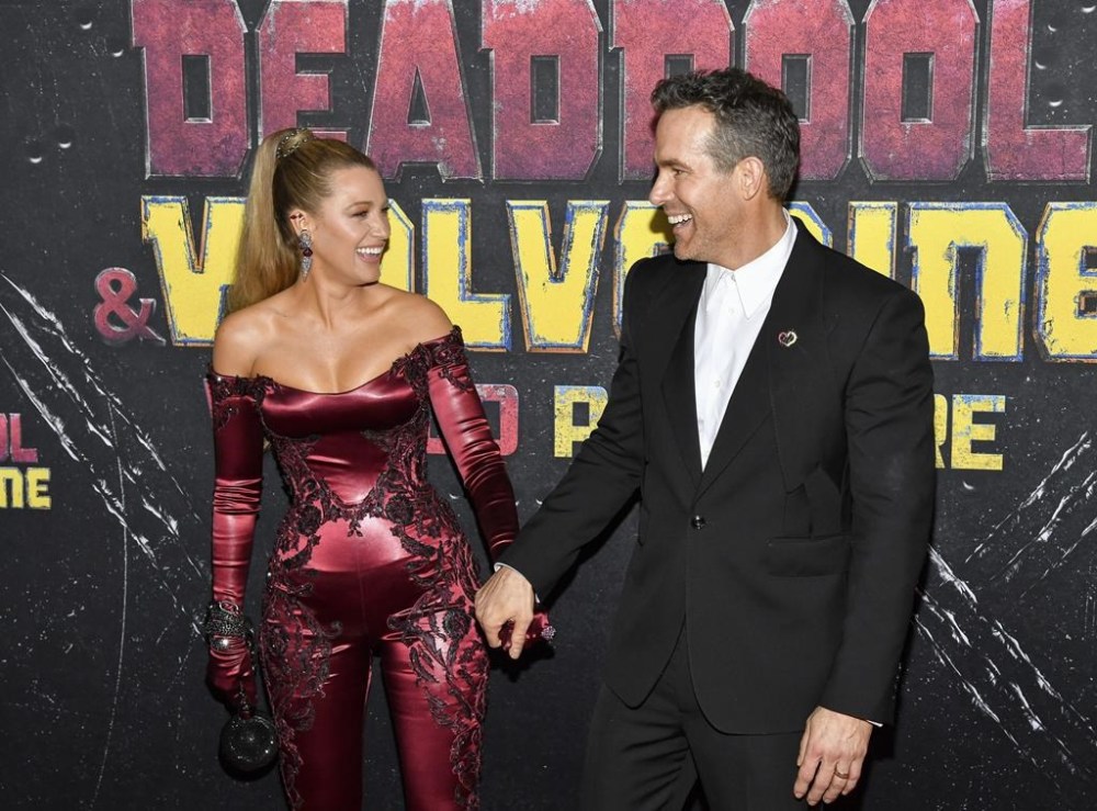 Blake Lively, left, and Ryan Reynolds attend the world premiere of Marvel Studios'