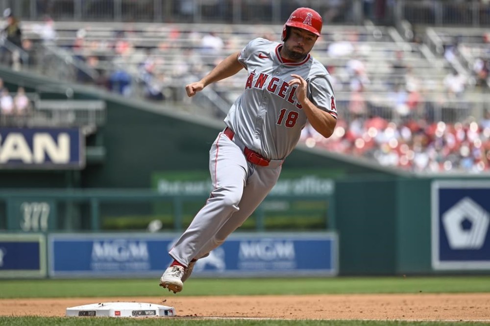 Los Angeles Angels' Nolan Schanuel heads home for a score on a three run RBI double by Angels' Kevin Pillar during the fourth inning of a baseball game against the Washington Nationals, Sunday, Aug. 11, 2024, in Washington. (AP Photo/John McDonnell)
