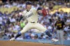 Los Angeles Dodgers' River Ryan delivers to the plate in the second inning against the during a baseball game against the Pittsburgh Pirates Saturday, Aug. 10, 2024, in Los Angeles. (AP Photo/Jayne-Kamin-Oncea)