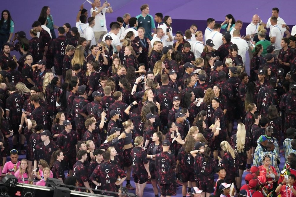 Team Canada walks into the stadium during the 2024 Summer Olympics closing ceremony at the Stade de France, Sunday, Aug. 11, 2024, in Saint-Denis, France. THE CANADIAN PRESS/AP-Martin Meissner