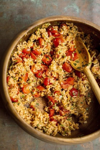 This image released by Milk Street shows a recipe for Indian tomato rice. (Milk Street via AP)