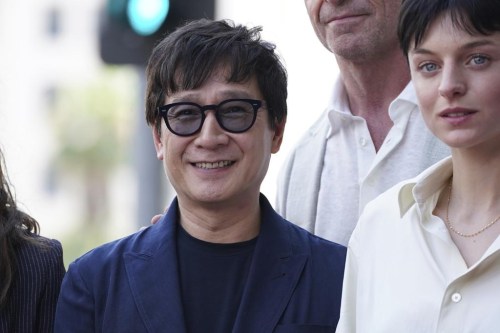 Ke Huy Quan, left and Emma Corrin attend a ceremony honoring Kevin Feige with a star on the Hollywood Walk of Walk of Fame on Thursday, July 25, 2024, in Los Angeles. (Photo by Jordan Strauss/Invision/AP)
