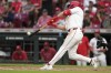 Cincinnati Reds' Spencer Steer hits a three-run home run during the fifth inning of a baseball game against the St. Louis Cardinals, Monday, Aug. 12, 2024, in Cincinnati. (AP Photo/Kareem Elgazzar)