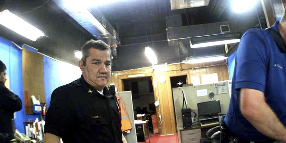 FILE - This image from Marion, Kan., Police Department body camera video provided by the McDonald Tinker law firm shows former Marion Police Chief Gideon Cody during his department's raid of the Marion County Record newspaper on Aug. 11, 2023, in Marion, Kan. (McDonald Tinker via AP)