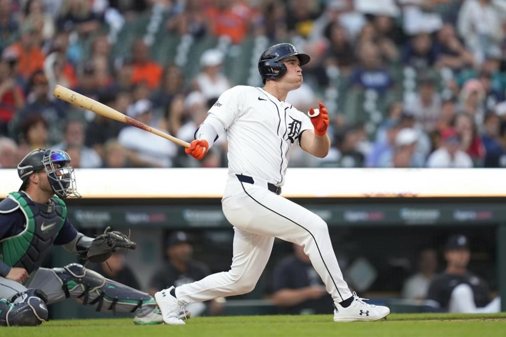 Detroit Tigers' Kerry Carpenter hits a home run against the Seattle Mariners in the fourth inning of a baseball game, Tuesday, Aug. 13, 2024, in Detroit. (AP Photo/Paul Sancya)