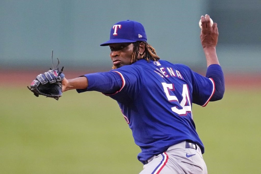 Texas Rangers pitcher Jose Urena delivers during the first inning of a baseball game against the Boston Red Sox at Fenway Park, Tuesday, Aug. 13, 2024, in Boston. (AP Photo/Charles Krupa)