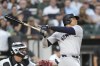New York Yankees' Juan Soto watches his two-run home run off Chicago White Sox starting pitcher Jonathan Cannon during the third inning of a baseball game Tuesday, Aug. 13, 2024, in Chicago. (AP Photo/Charles Rex Arbogast)