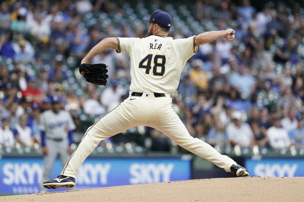 Milwaukee Brewers' Colin Rea pitches during the first inning of a baseball game against the Los Angeles Dodgers, Tuesday, Aug. 13, 2024, in Milwaukee. (AP Photo/Aaron Gash)