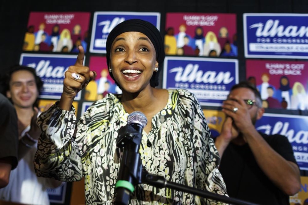Rep. Ilhan Omar speaks after winning the primary at Nighthawks in Minneapolis, Tuesday, Aug. 13, 2024. (Kerem Yücel/Minnesota Public Radio via AP)