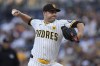 San Diego Padres starting pitcher Michael King works against a Pittsburgh Pirates batter during the first inning of a baseball game Tuesday, Aug. 13, 2024, in San Diego. (AP Photo/Gregory Bull)
