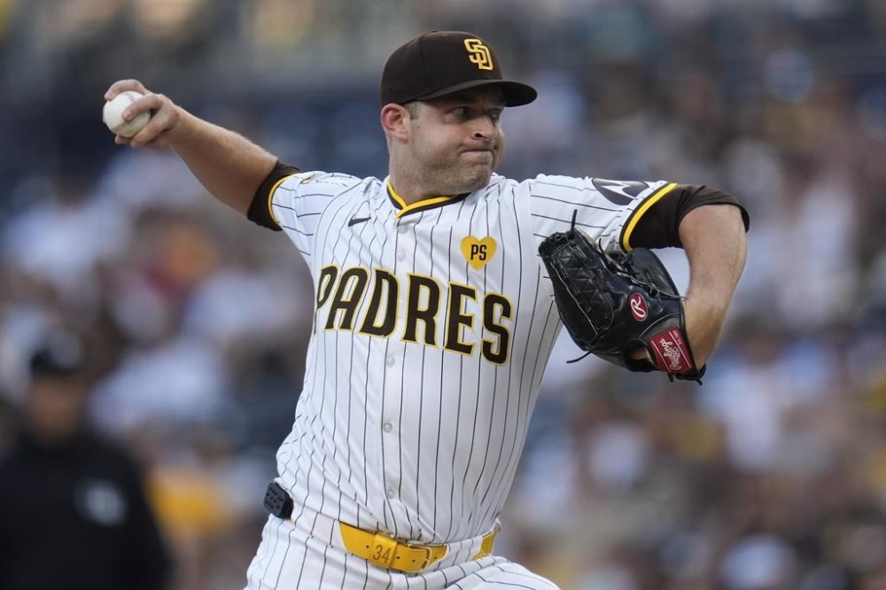 San Diego Padres starting pitcher Michael King works against a Pittsburgh Pirates batter during the first inning of a baseball game Tuesday, Aug. 13, 2024, in San Diego. (AP Photo/Gregory Bull)