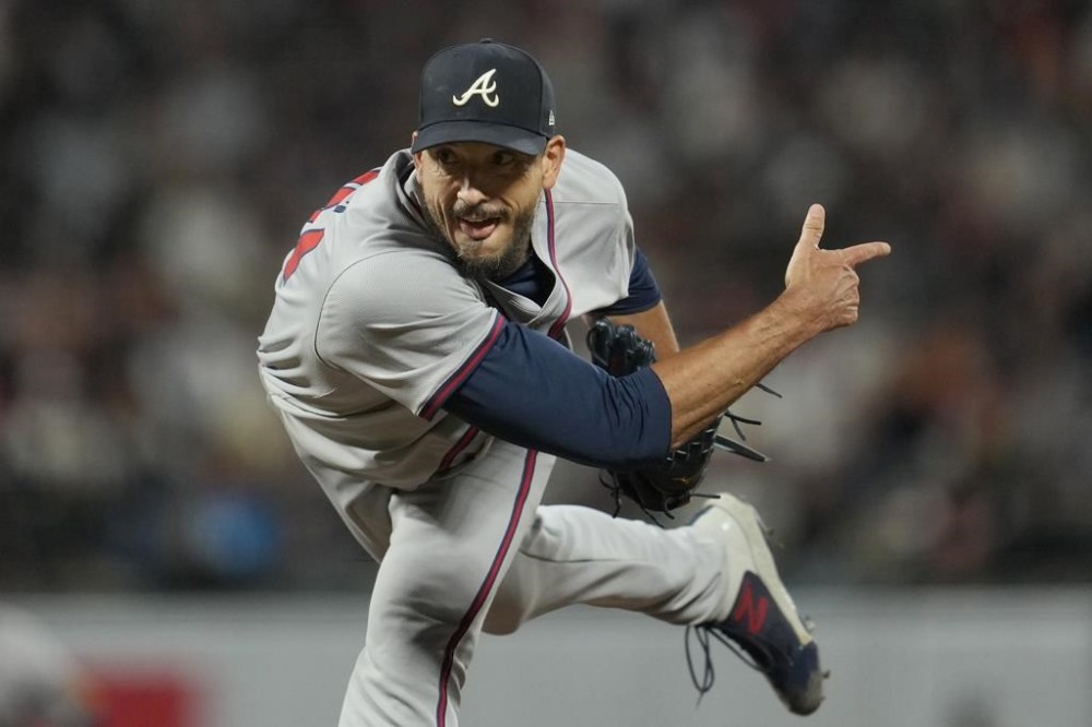 Atlanta Braves pitcher Charlie Morton follows through on a pitch that struck out San Francisco Giants' Mike Yastrzemski during the sixth inning of a baseball game in San Francisco, Tuesday, Aug. 13, 2024. (AP Photo/Jeff Chiu)