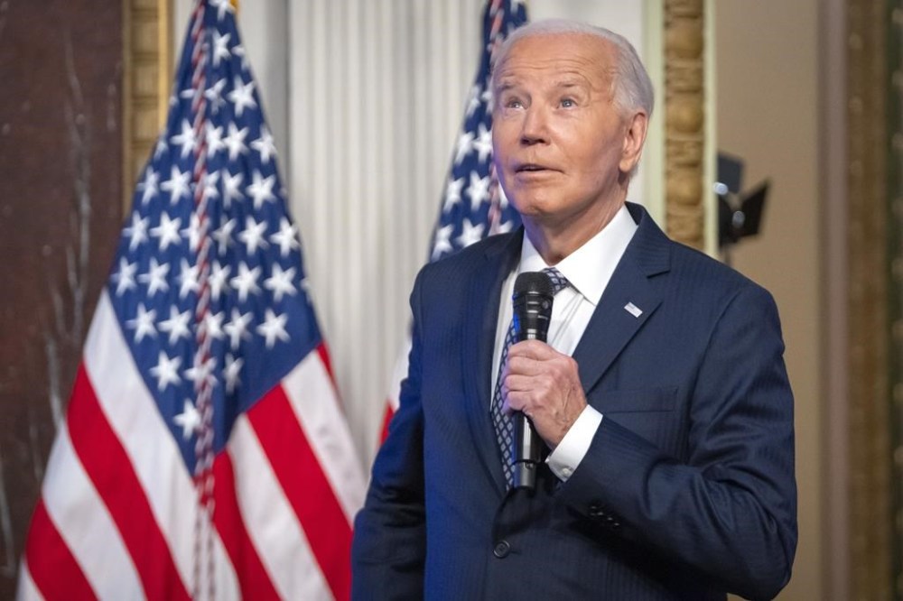 President Joe Biden speaks at the White House Creator Economy Conference in the Indian Treaty Room at the Eisenhower Executive Office Building on the White House complex, Wednesday, Aug. 14, 2024, in Washington. (AP Photo/Mark Schiefelbein)