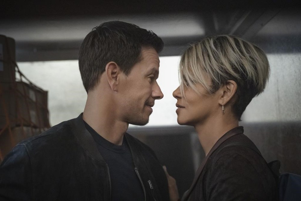 This image released by Netflix shows Mark Wahlberg, left, and Halle Berry in a scene from