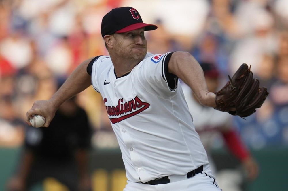 Cleveland Guardians' Alex Cobb pitches in the first inning of a baseball game against the Chicago Cubs, Wednesday, Aug. 14, 2024, in Cleveland. (AP Photo/Sue Ogrocki)
