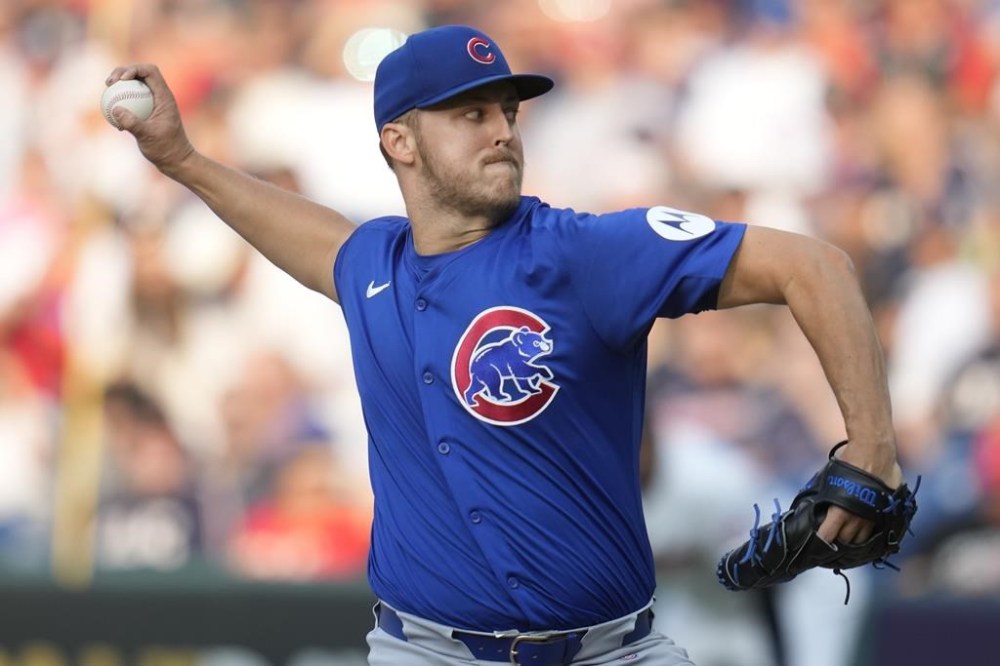 Chicago Cubs' Jameson Taillon pitches in the first inning of a baseball game against the Cleveland Guardians, Wednesday, Aug. 14, 2024, in Cleveland. (AP Photo/Sue Ogrocki)