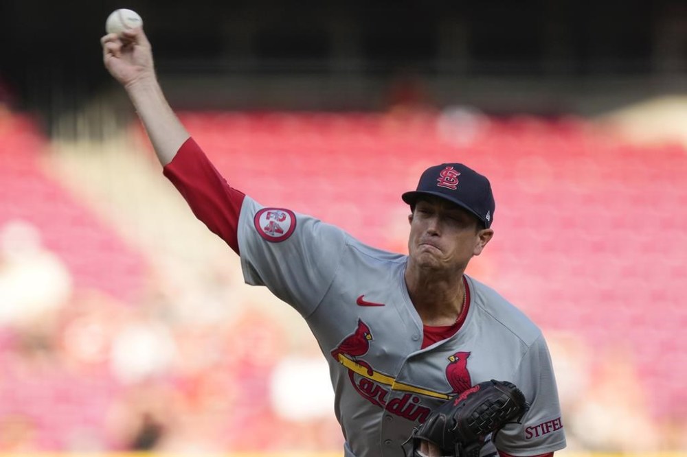 St. Louis Cardinals starting pitcher Kyle Gibson throws during the first inning of a baseball game against the Cincinnati Reds, Wednesday, Aug. 14, 2024, in Cincinnati. (AP Photo/Carolyn Kaster)