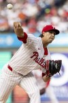Philadelphia Phillies pitcher Tyler Phillips throws in the first inning of a baseball game against the Miami Marlins, Wednesday, Aug. 14, 2024, in Philadelphia. (AP Photo/Laurence Kesterson)