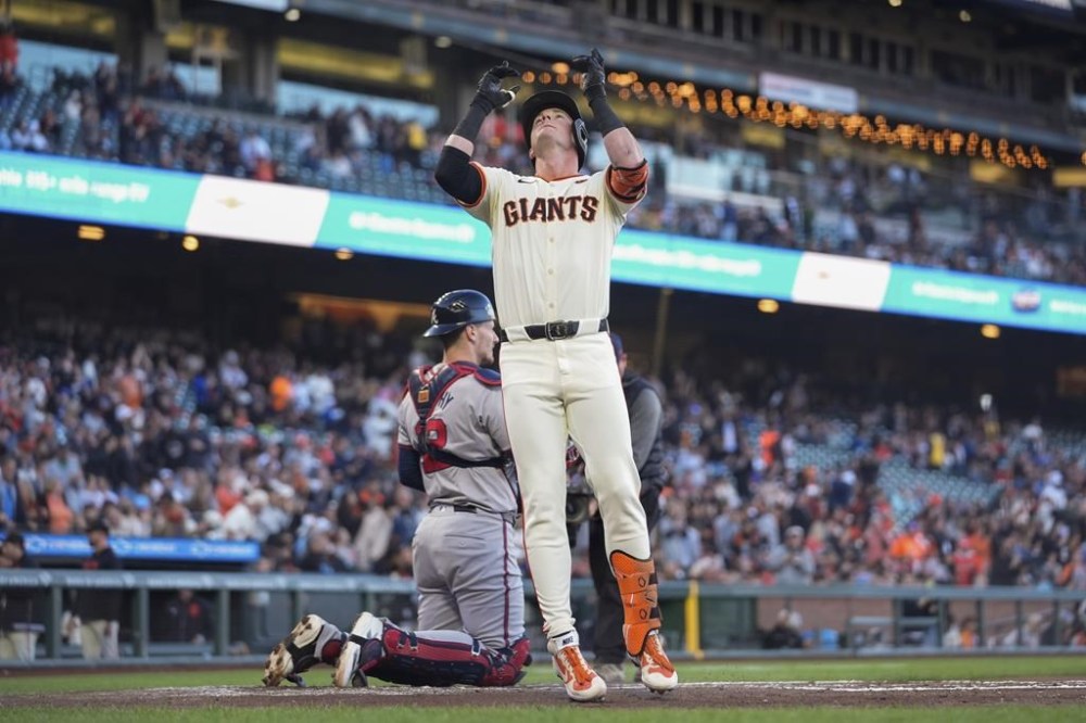 San Francisco Giants' Tyler Fitzgerald celebrates after hitting a solo home run against the Atlanta Braves during the first inning of a baseball game Wednesday, Aug. 14, 2024, in San Francisco. (AP Photo/Godofredo A. Vásquez)