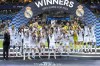 Real Madrid's Luka Modric lifts the trophy after winning the UEFA Super Cup Final soccer match between Real Madrid and Atalanta at the Narodowy stadium in Warsaw, Poland, Wednesday, Aug. 14, 2024. Real Madrid won 2-0. (AP Photo/Darko Bandic)