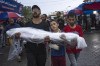 FILE - Palestinians mourn their relatives killed in the Israeli bombardment of the Gaza Strip, outside the hospital in Khan Younis, Tuesday, Nov. 14, 2023. (AP Photo/Fatima Shbair, File)
