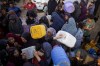 Palestinians displaced by the Israeli bombardment of the Gaza Strip queue for water at a makeshift tent camp in the southern town of Khan Younis, Monday, July 1, 2024. THE CANADIAN PRESS/AP-Jehad Alshrafi