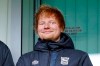 FILE - Ipswich Town fan Ed Sheeran in the stands before the Sky Bet Championship match at Portman Road, Ipswich, England, on Dec. 16, 2023. Sheeran has bought a small stake in the club ahead of its return to the Premier League. (Joe Giddens/PA via AP, File)