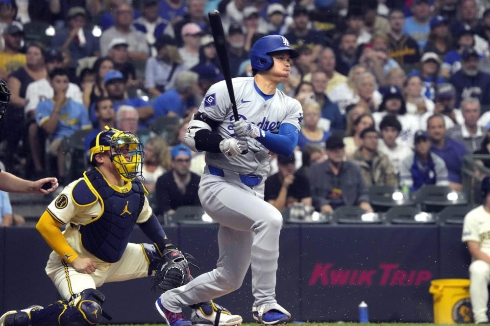 Los Angeles Dodgers' Shohei Ohtani (17) grounds out during the third inning of a baseball game against the Milwaukee Brewers, Thursday, Aug. 15, 2024, in Milwaukee. (AP Photo/Kayla Wolf)