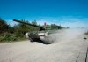 The Canadian Forces Leopard 2A4 tank makes its way onto the firing range for a demonstration at CFB Gagetown in Oromocto, N.B., on September 13, 2012. The federal government says the Ukrainian army can use military equipment provided by Canada inside Russia. THE CANADIAN PRESS/David Smith