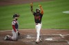 Baltimore Orioles' Cedric Mullins (31) celebrates his home run in front of Boston Red Sox catcher Connor Wong, left, during the fifth inning of a baseball game, Thursday, Aug. 15, 2024, in Baltimore. (AP Photo/Nick Wass)
