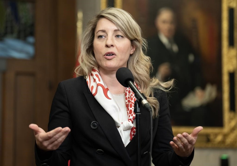 Minister of Foreign Affairs Melanie Joly speaks with reporters in the foyer of the House of Commons on Tuesday, May 21, 2024 in Ottawa. THE CANADIAN PRESS/Adrian Wyld