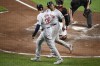 Boston Red Sox' Rafael Devers, back, celebrates his two-run home run with Triston Casas (36) during the third inning of a baseball game against the Baltimore Orioles, Friday, Aug. 16, 2024, in Baltimore. (AP Photo/Nick Wass)