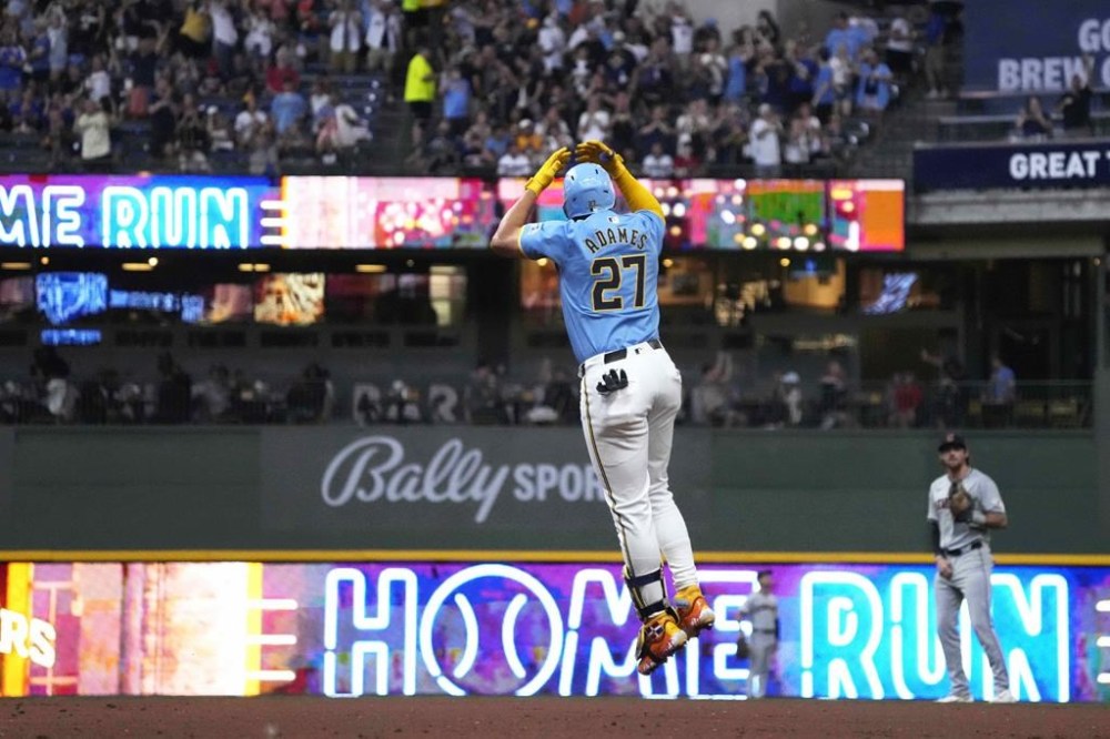 Milwaukee Brewers' Willy Adames (27) runs the bases after hitting a three-run home run during the first inning of a baseball game against the Cleveland Guardians, Friday, Aug. 16, 2024, in Milwaukee. (AP Photo/Kayla Wolf)