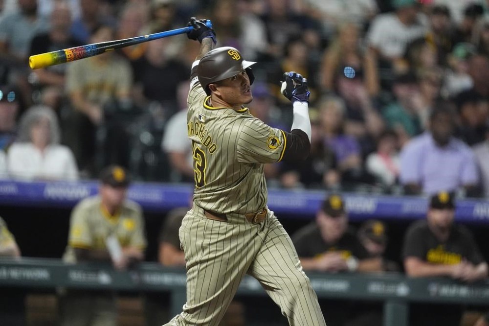 San Diego Padres' Manny Machado grounds out against Colorado Rockies relief pitcher Victor Vodnik to end a baseball game Friday, Aug. 16, 2024, in Denver. (AP Photo/David Zalubowski)