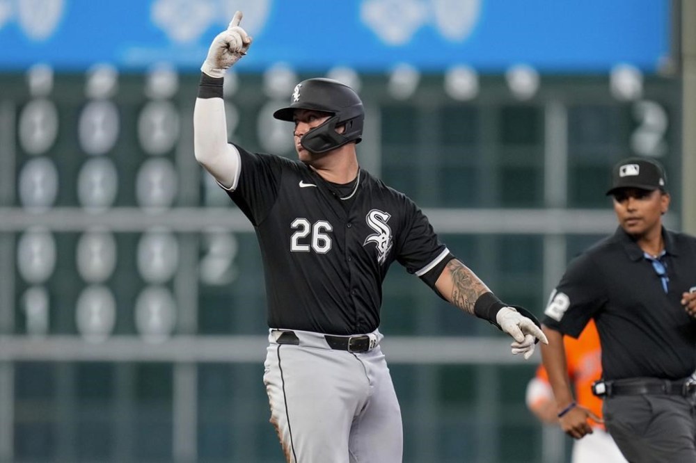 Chicago White Sox's Korey Lee (26) reacts after hitting a double against the Houston Astros during the second inning of a baseball game Friday, Aug. 16, 2024, in Houston. (AP Photo/Eric Christian Smith)