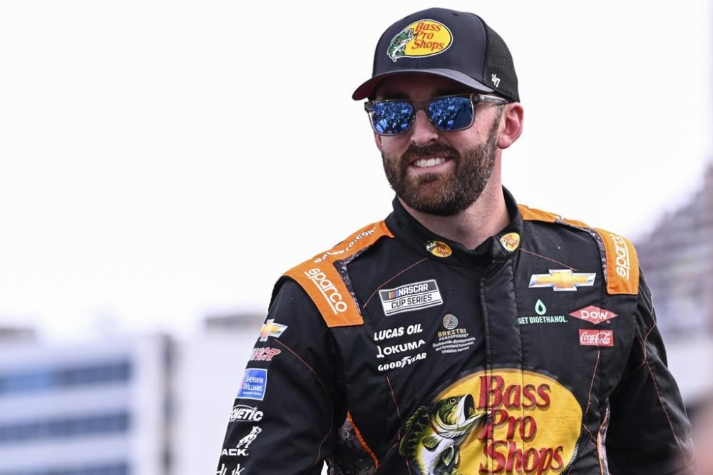 FILE - Driver Austin Dillon smiles prior to a NASCAR Cup Series auto race at Charlotte Motor Speedway, Sunday, May 26, 2024, in Concord, N.C. (AP Photo/Matt Kelley, File)