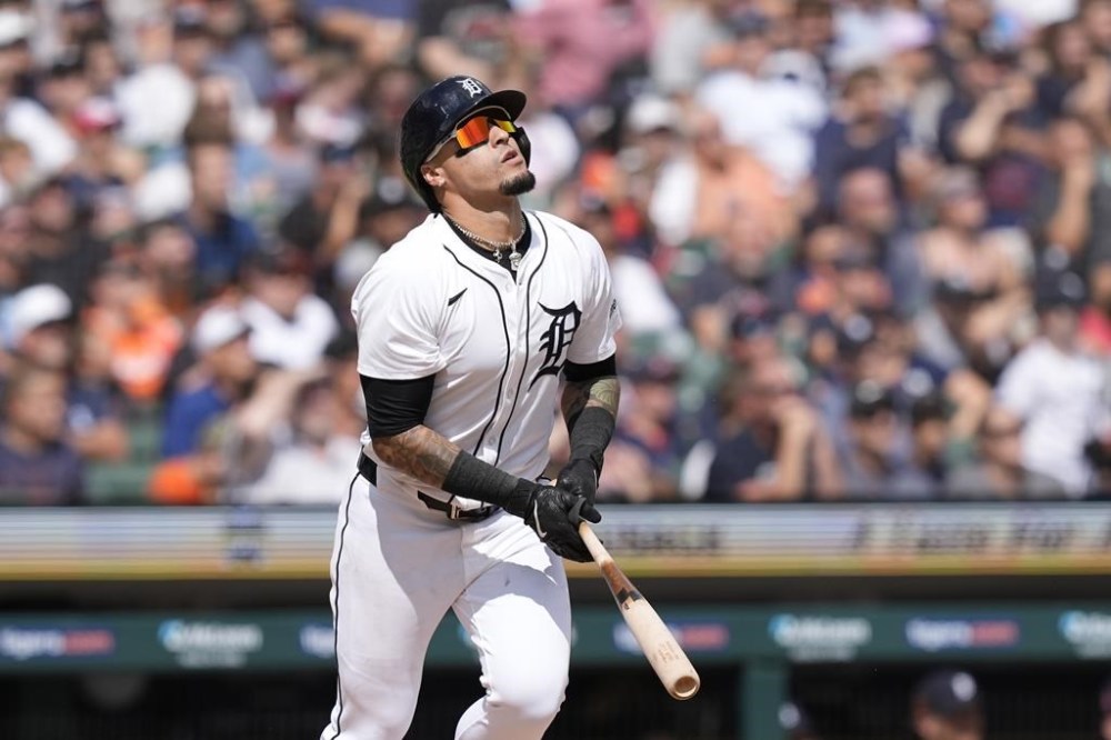 Detroit Tigers' Javier Báez watches his fly out during the eighth inning of a baseball game against the New York Yankees, Saturday, Aug. 17, 2024, in Detroit. (AP Photo/Carlos Osorio)
