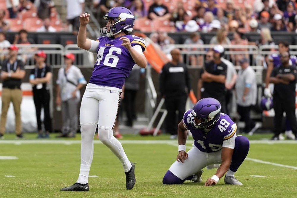 Minnesota Vikings kicker Will Reichard (46) kicks a field goal against the Cleveland Browns during the second half of an NFL preseason football game, Saturday, Aug. 17, 2024, in Cleveland. (AP Photo/Sue Ogrocki)